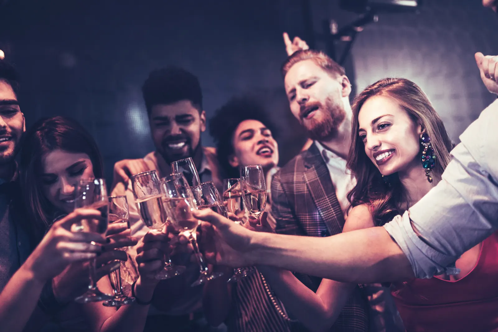 Friends raising a toast on their debs night